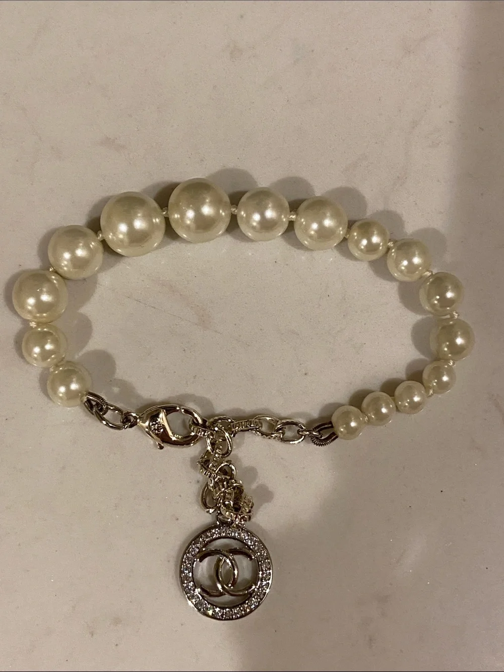 Pearl Bead Bracelet with Interlocking CC Logo Charm - Cream
